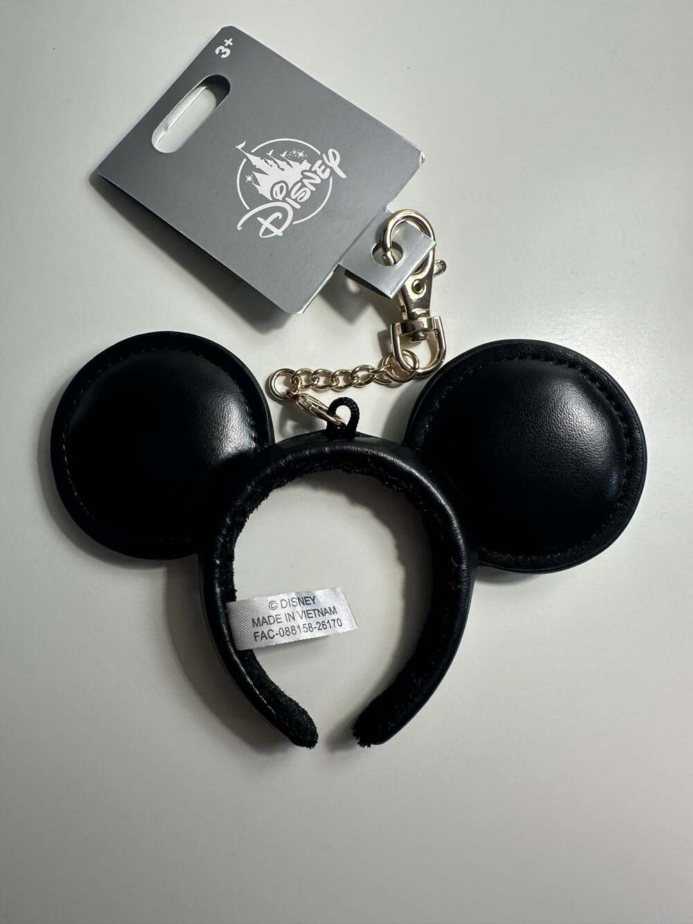 Disney Parks Black Mickey Mouse Headband Ears Bag
Charm Keychain